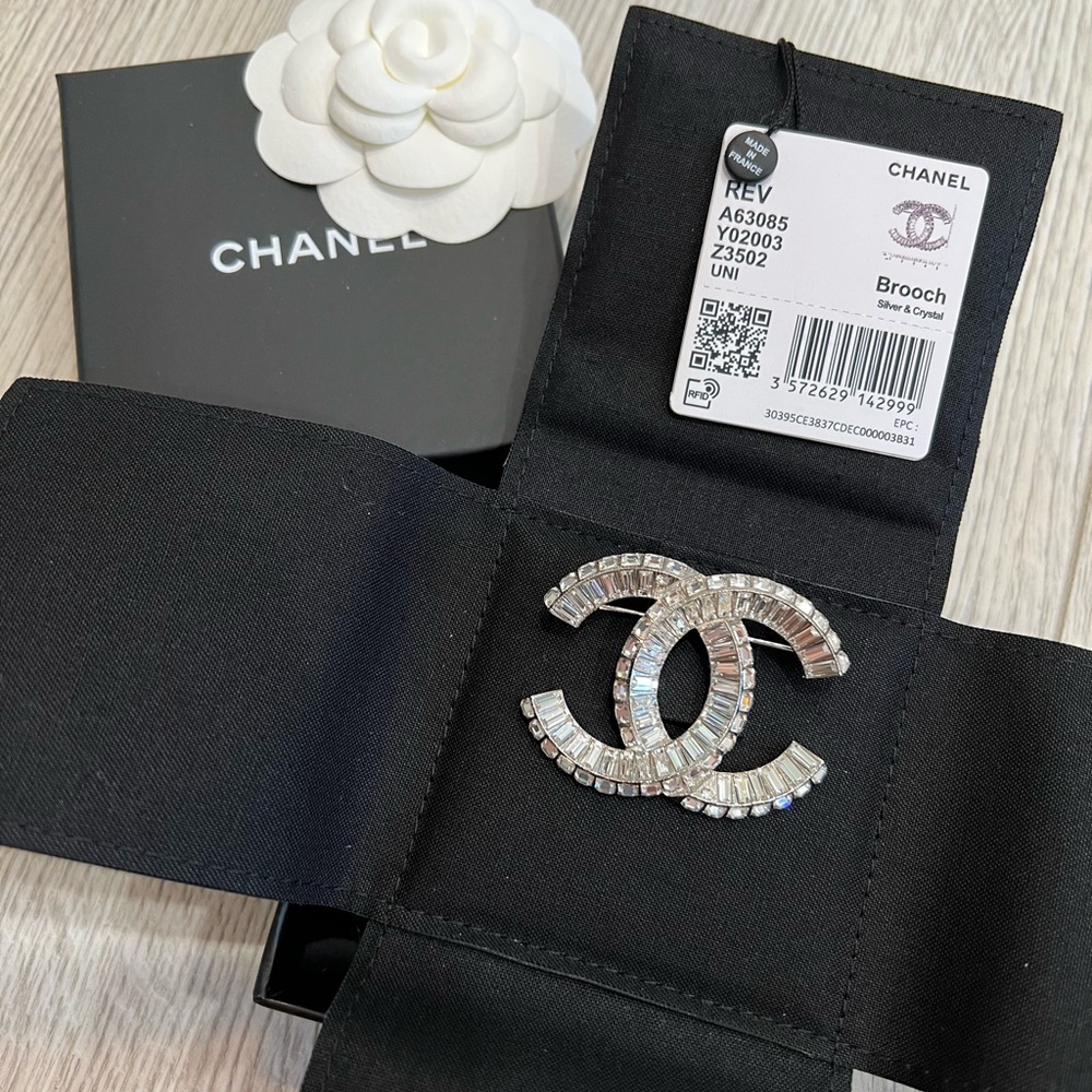 Chanel Brooch Crystal . Brand new come with original package and receipt .